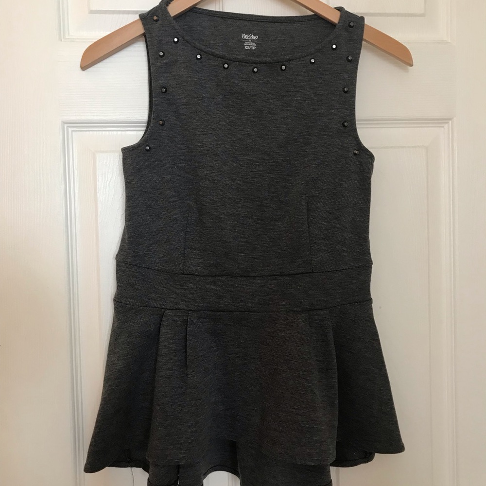 Gray peplum top with studded neck details!